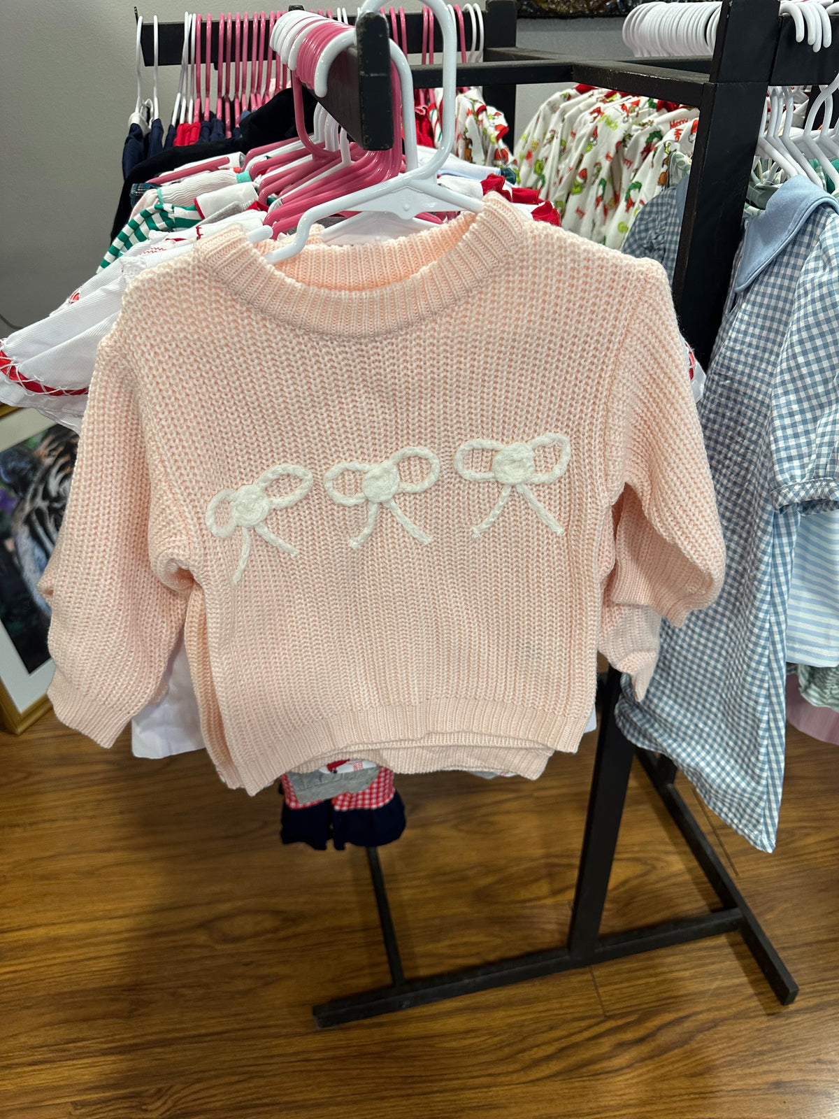 White Ribbon Sweaters